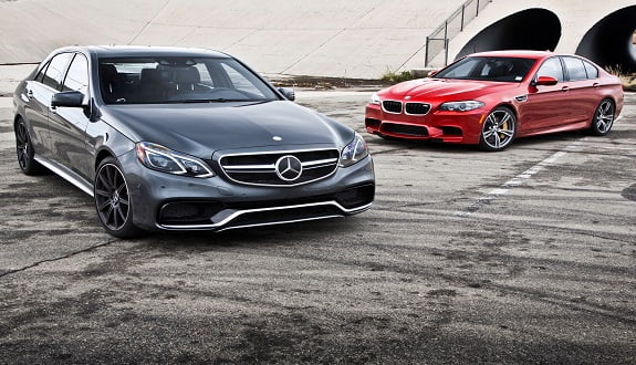 2014 mercedes benz e63 amg s bmw m5 front three quarters