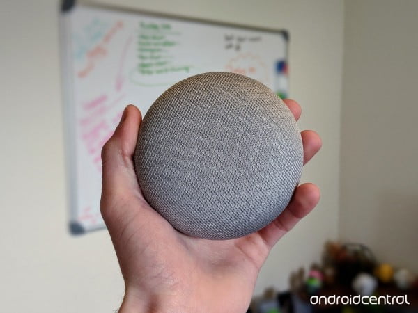 Google Home Mini in hand 0